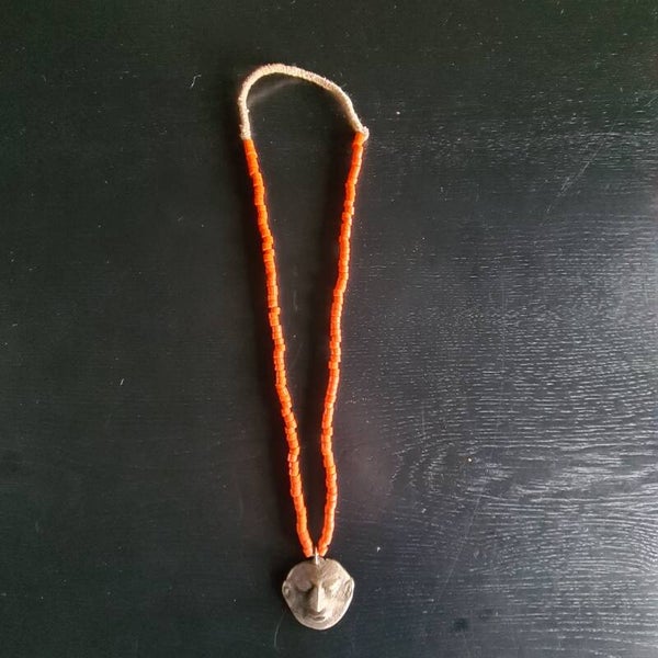 Red Bead Necklace with a small brass head pendant (#741)