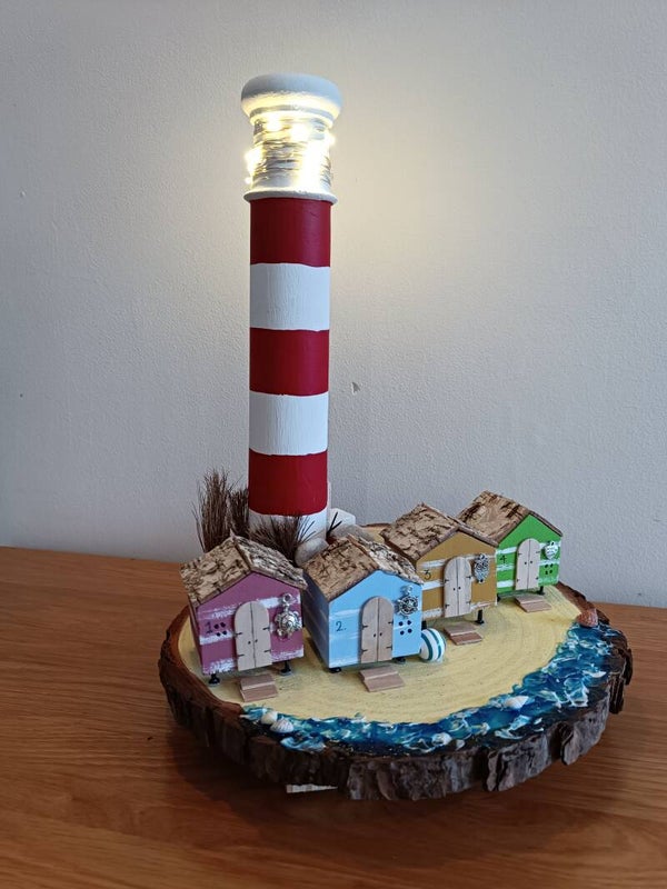 Lighthouse with Beach Huts