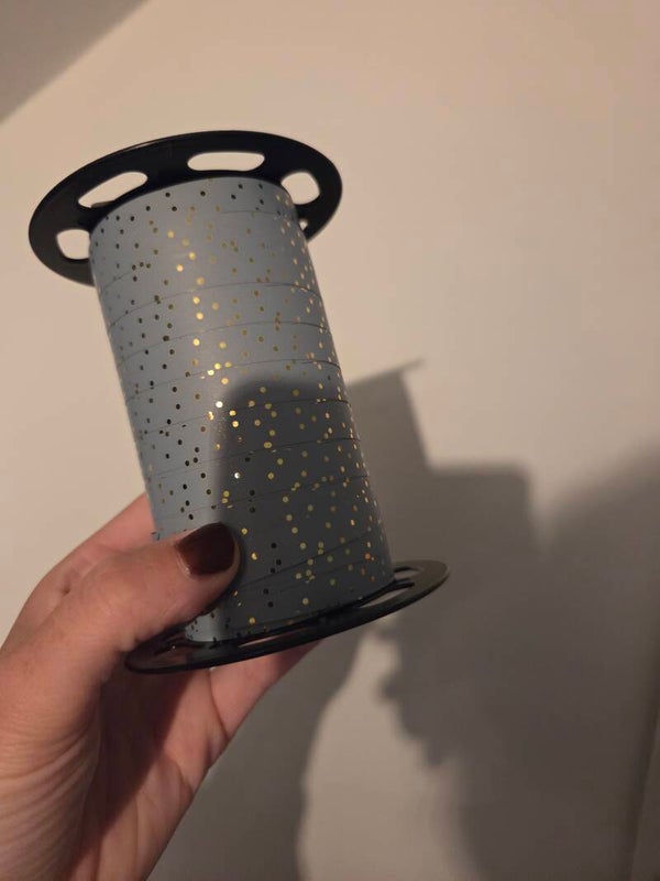 Rol lint blauw met gouden stippen