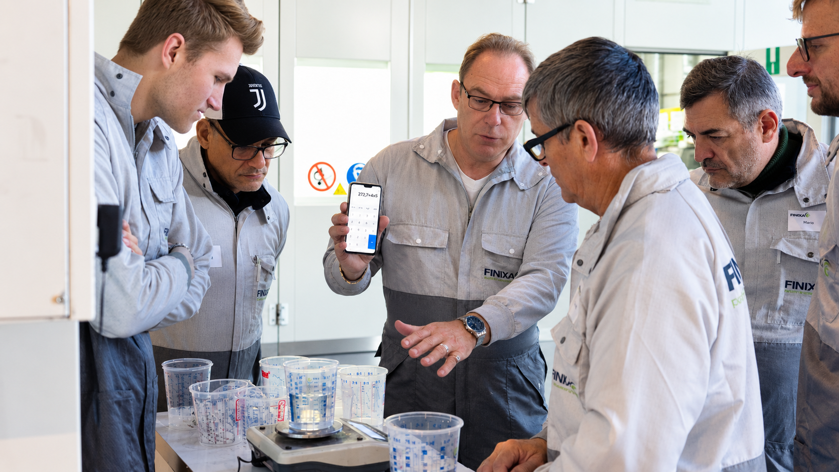 Dirk Van Driessche working with an automotive team during a practical workshop