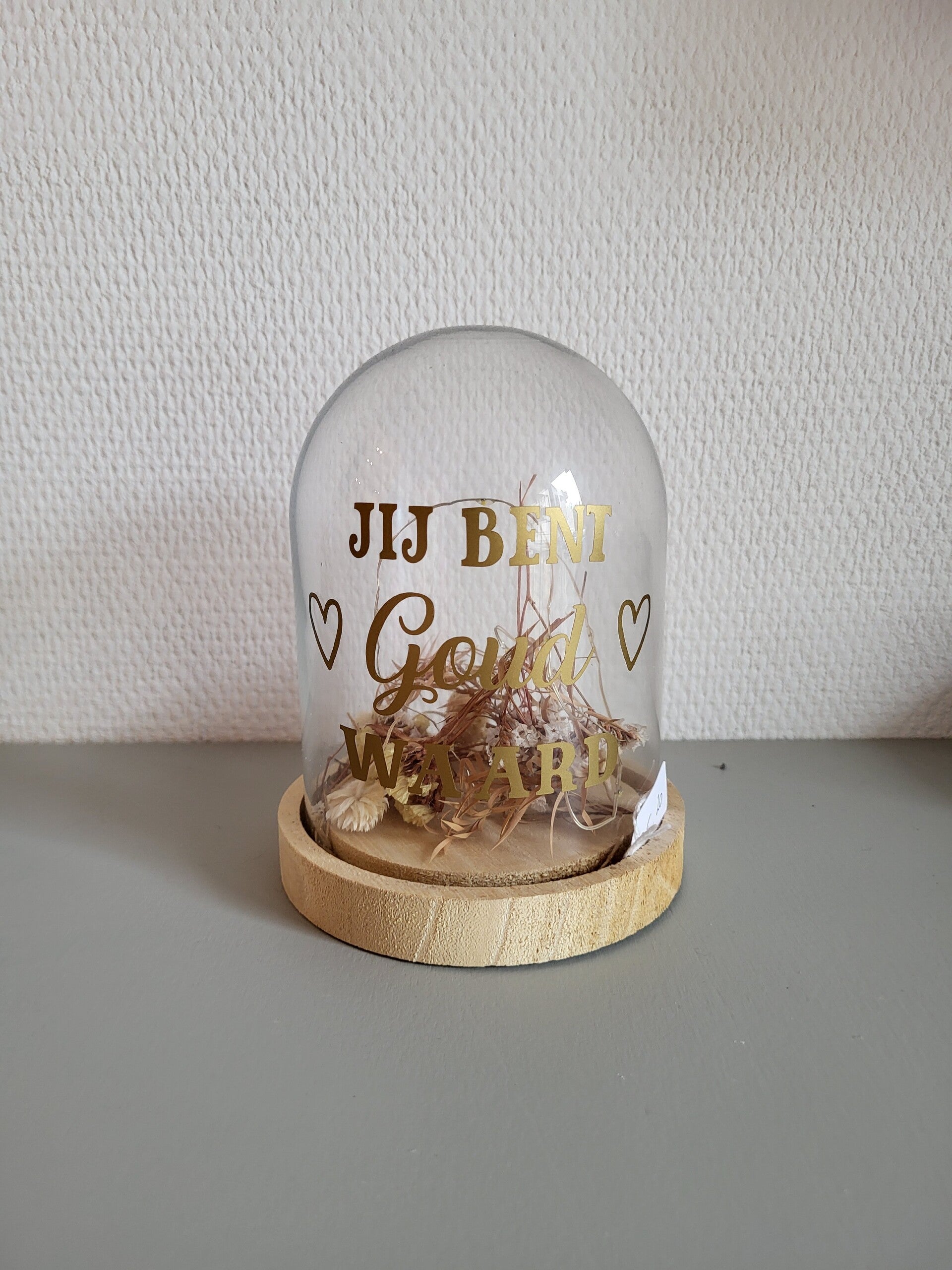 Stolp met licht en droogbloemen