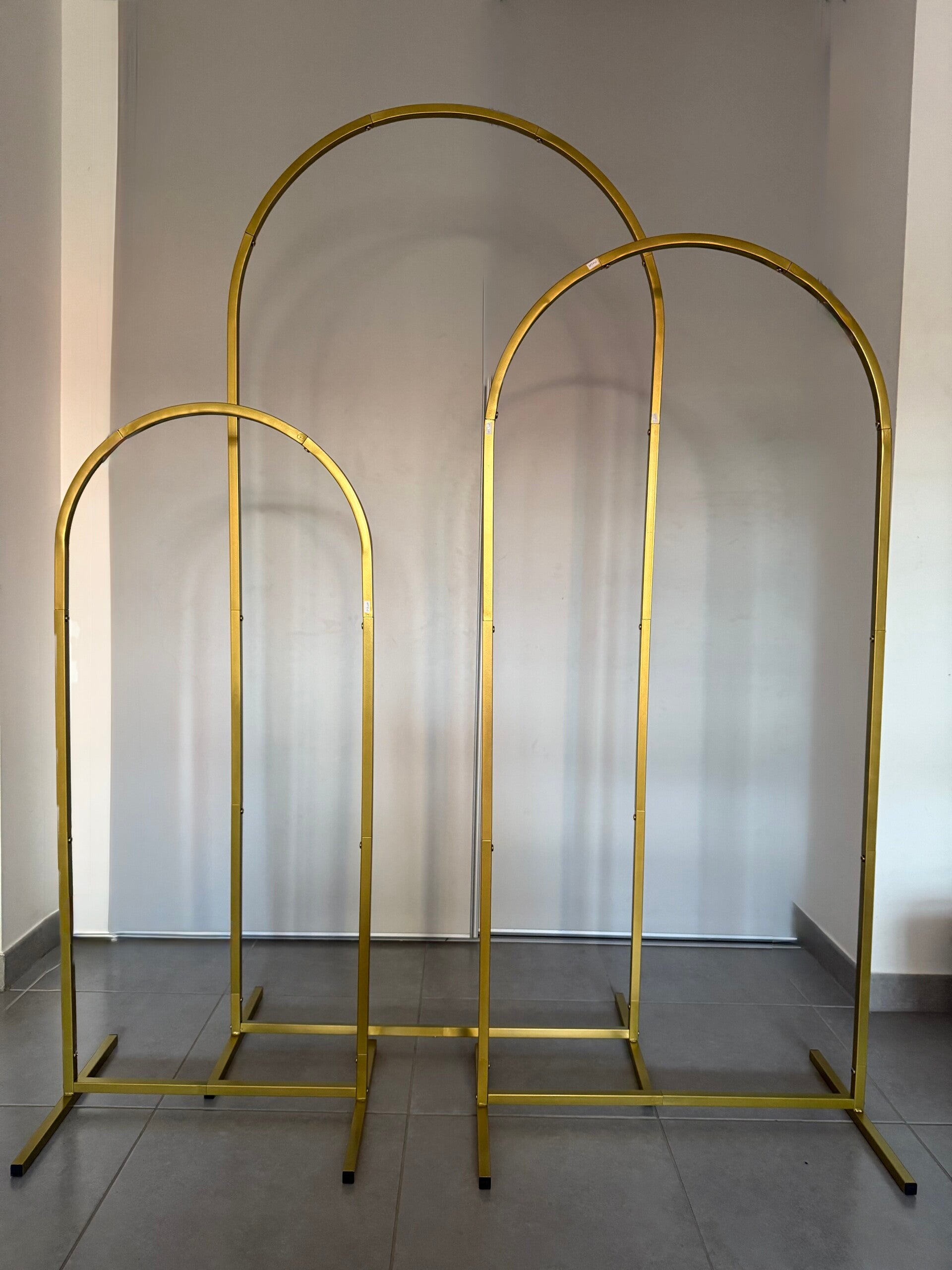 Trio d'arches dorées