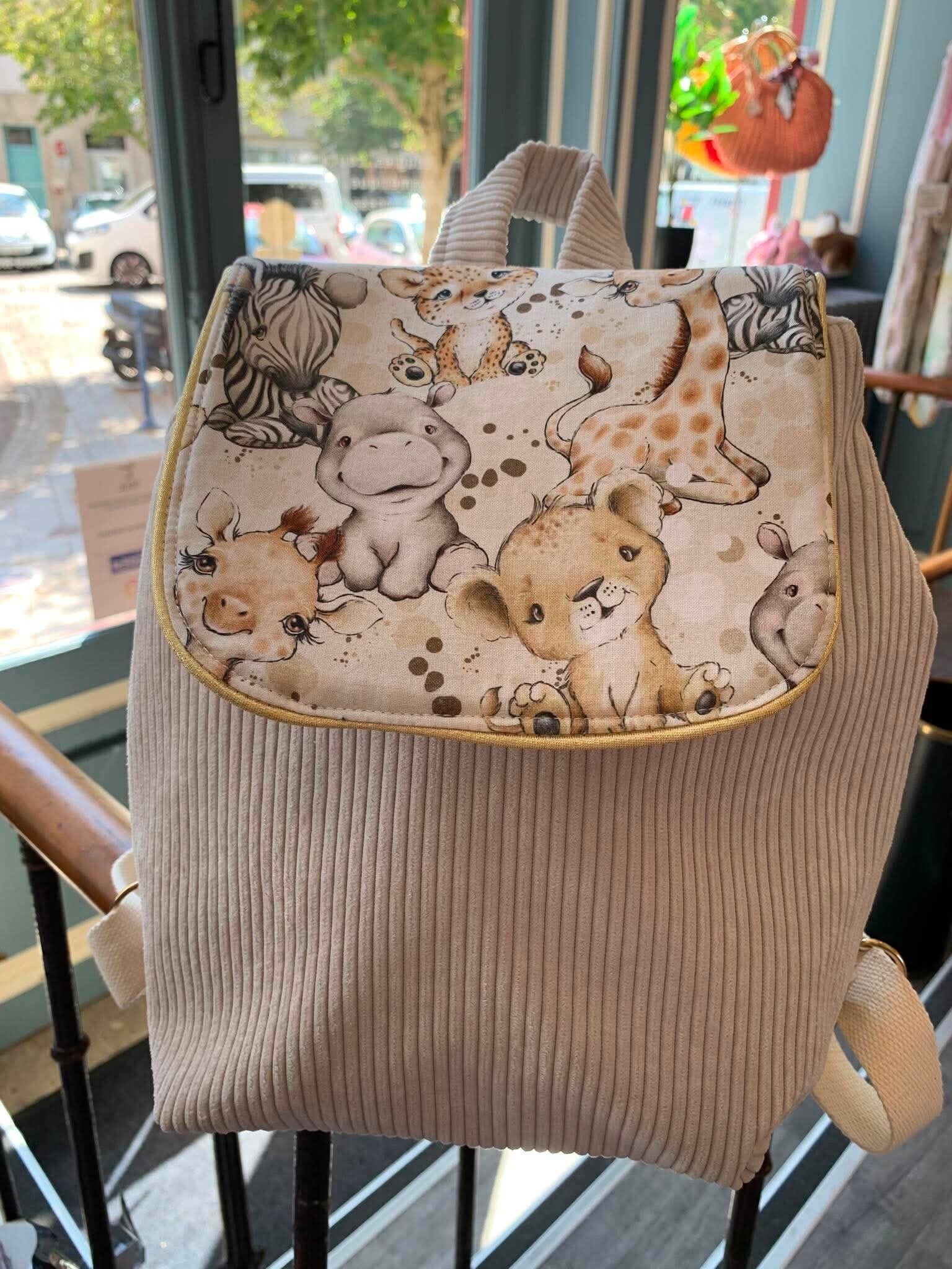 Sac à dos savane écrue 🦁🤍
