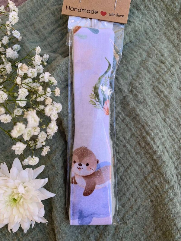 Accroche tétine loutre 🦦💚