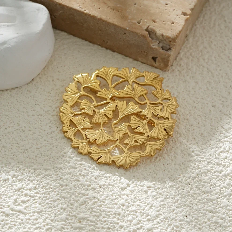 Broche acier inoxydable médaillon fleurs de ginkgo W162