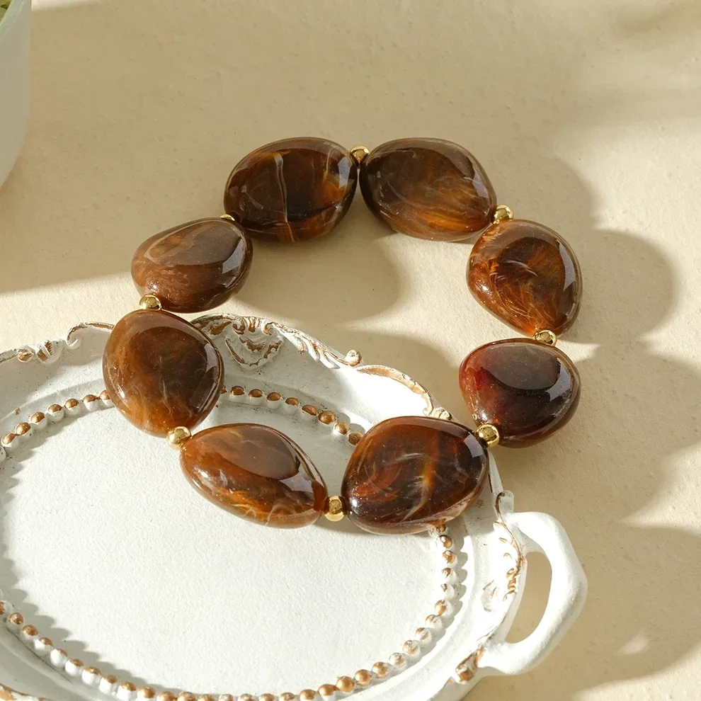 W141 - Bracelet élastique perles en acier inoxydable et acrylique organique - Chocolat