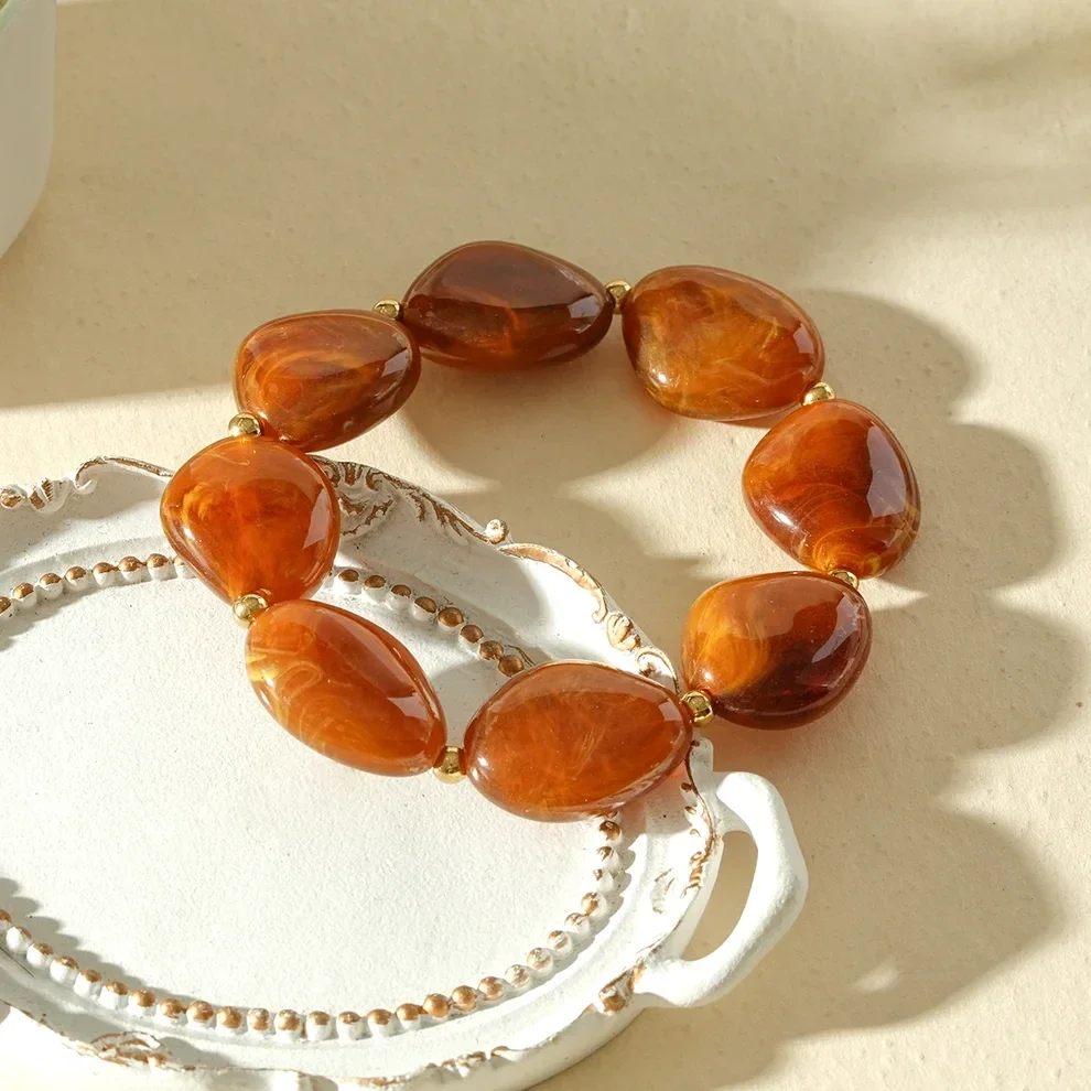 W139 - Bracelet élastique perles en acier inoxydable et acrylique organique - Ambre