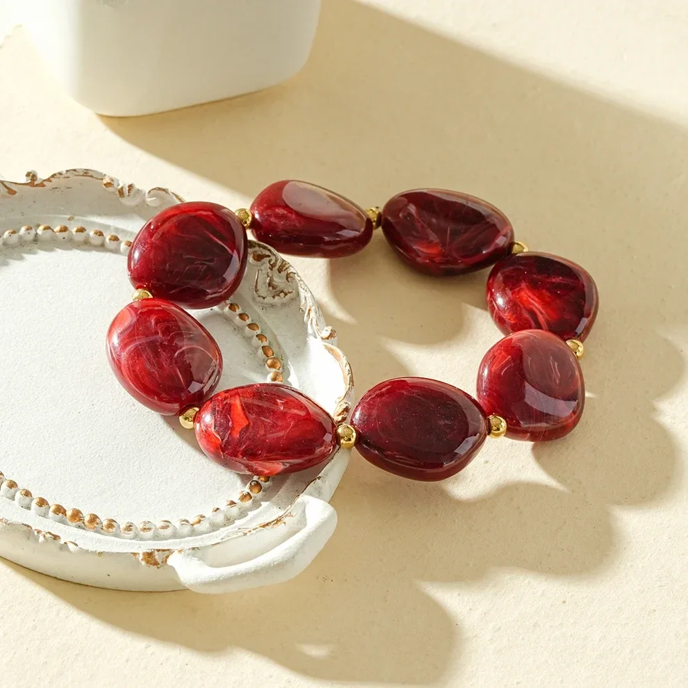 W140 - Bracelet élastique perles en acier inoxydable et acrylique organique - Bordeaux