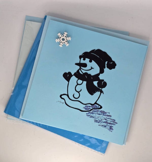 Schneemann mit Schneeflocke