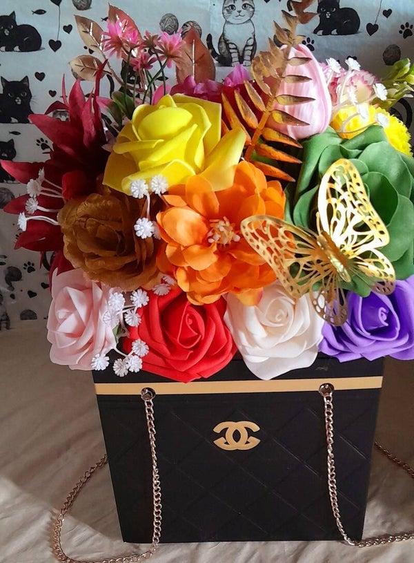 Sac fleuri noir et or