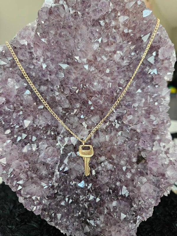 gouden ketting sleutel