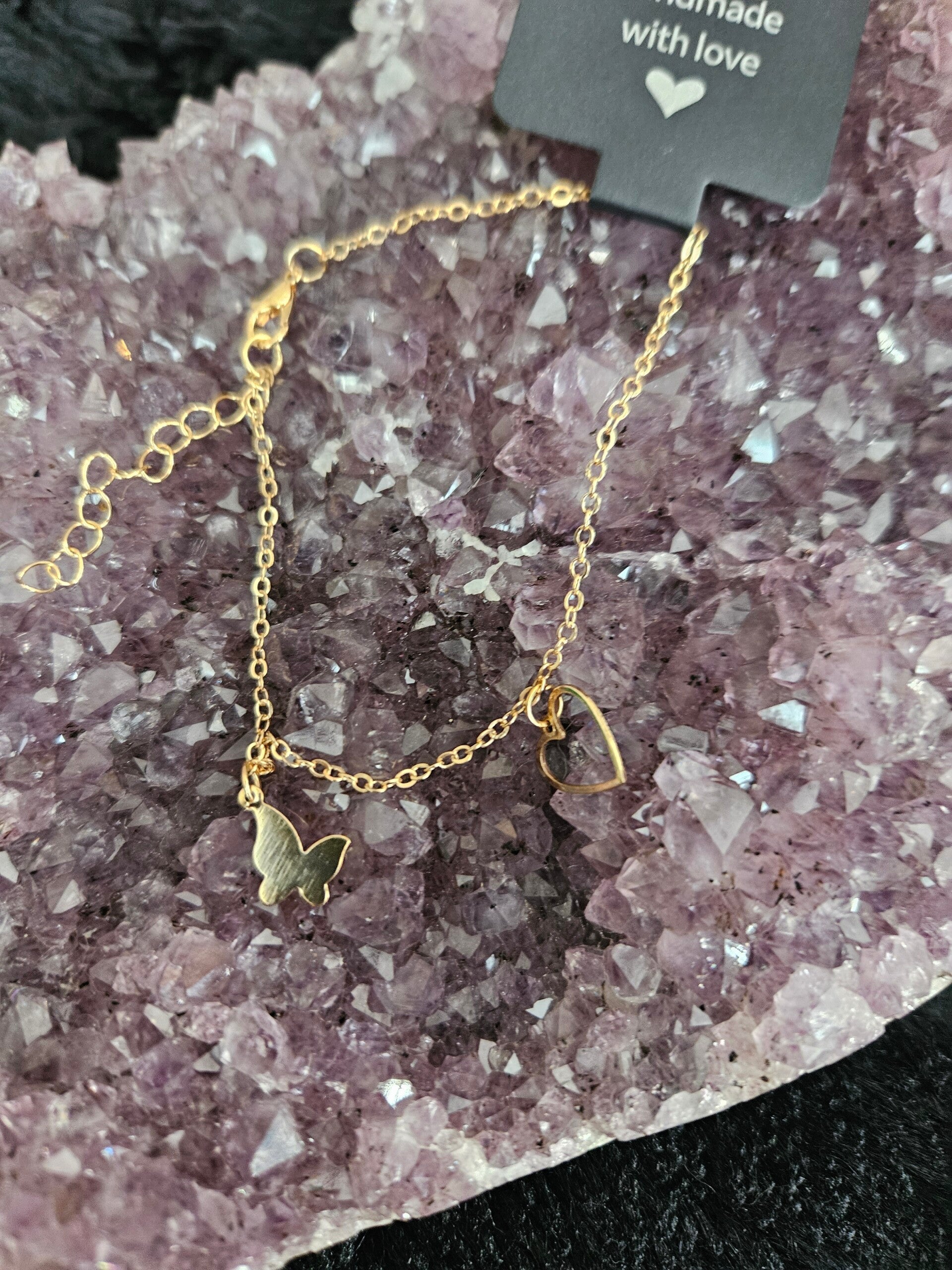 gouden armband hartje met vlinder