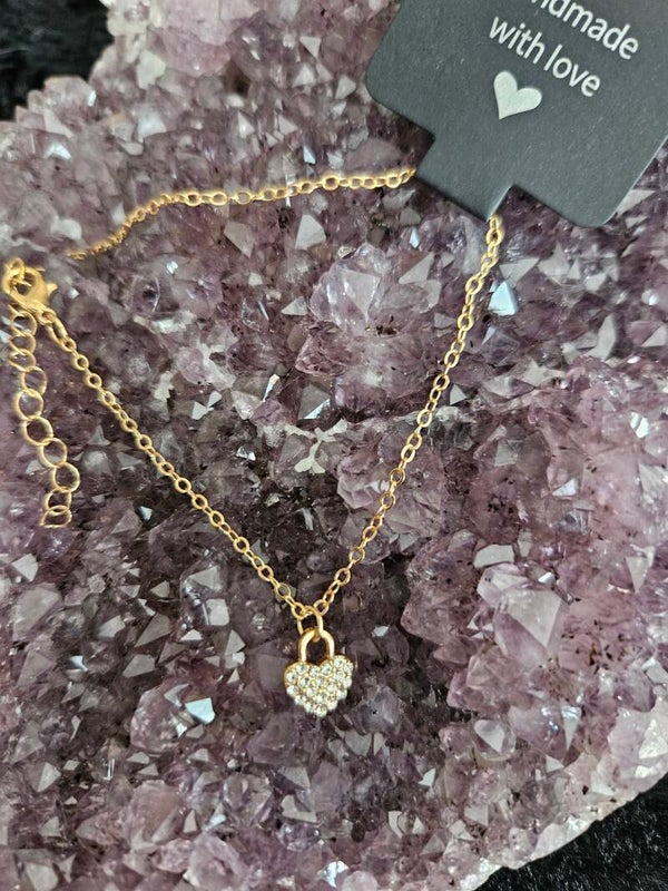 gouden armband strass hartje