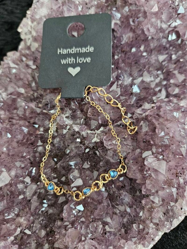 gouden armband blauwe hartjes