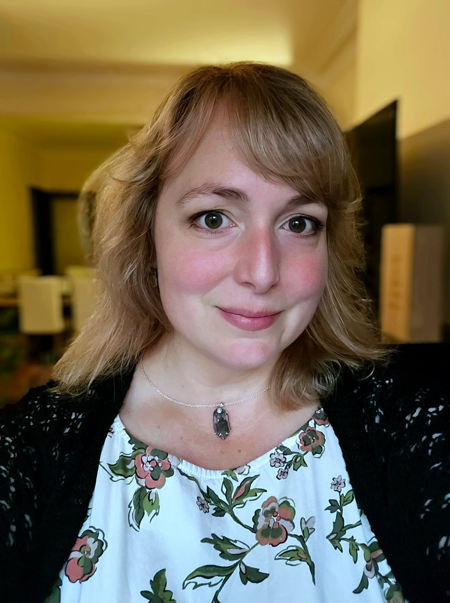 Collector wearing handmade sterling silver gothic jewelry from Atelier Wolfstone