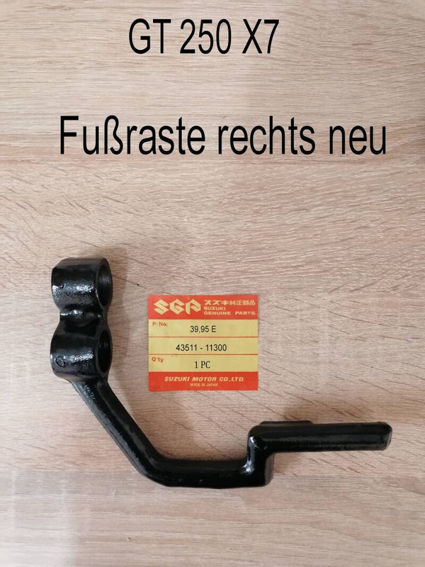 Suzuki GT 250 X7 Fußraste rechts neu.