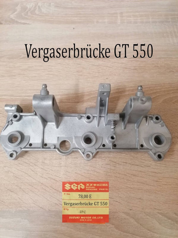 Suzuki GT 550 Vergaserbrücke gebraucht.