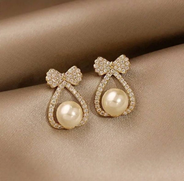 203 Aretes Perla y Lazo