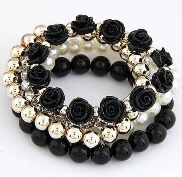 699	Pulsera rosas negra 4 piezas