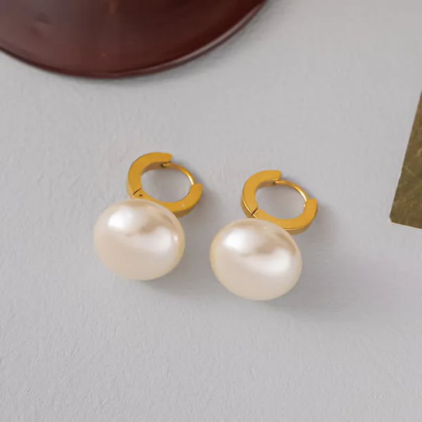 876	Aretes perlas blancas-acero titanio