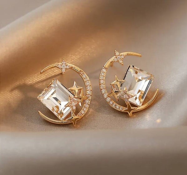 430 Aretes lunas y estrellas piedra transparente