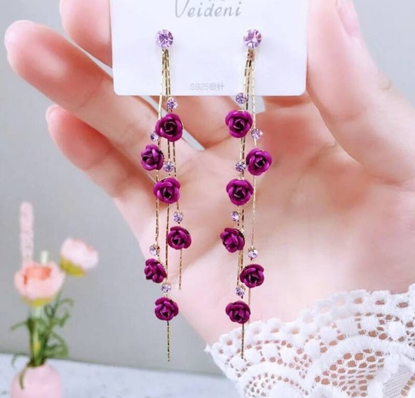349 Aretes rosas moradas y diamantes