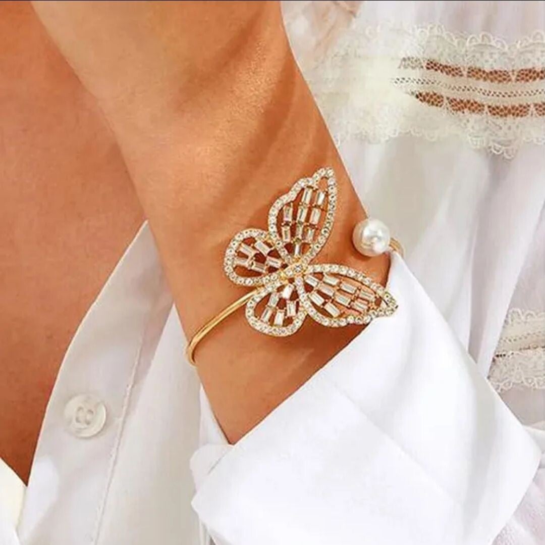 083 Pulsera mariposa y perla dorada