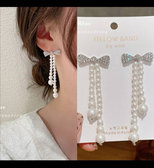 Aretes perlas y lazo