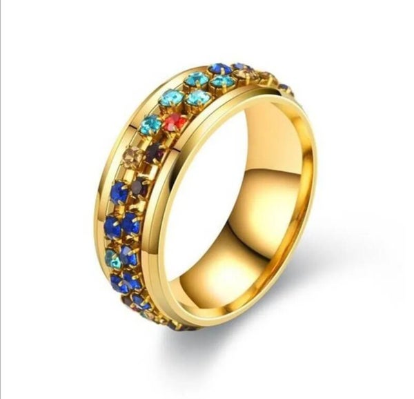 Anillo churumbela giratorio dorado