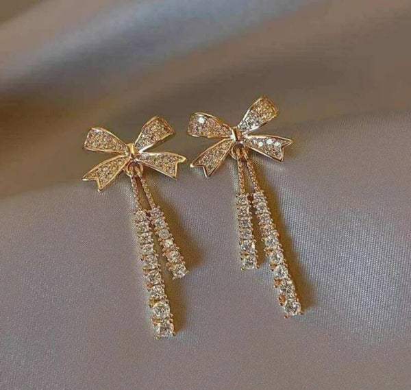 397 Aretes lazo dorado diamantado