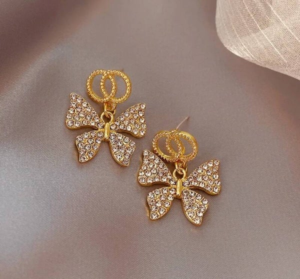 403 Aretes lazos y diamantes