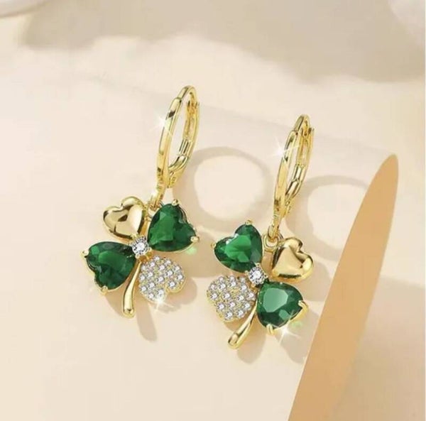 738	Aretes flor esmeralda y diamantes