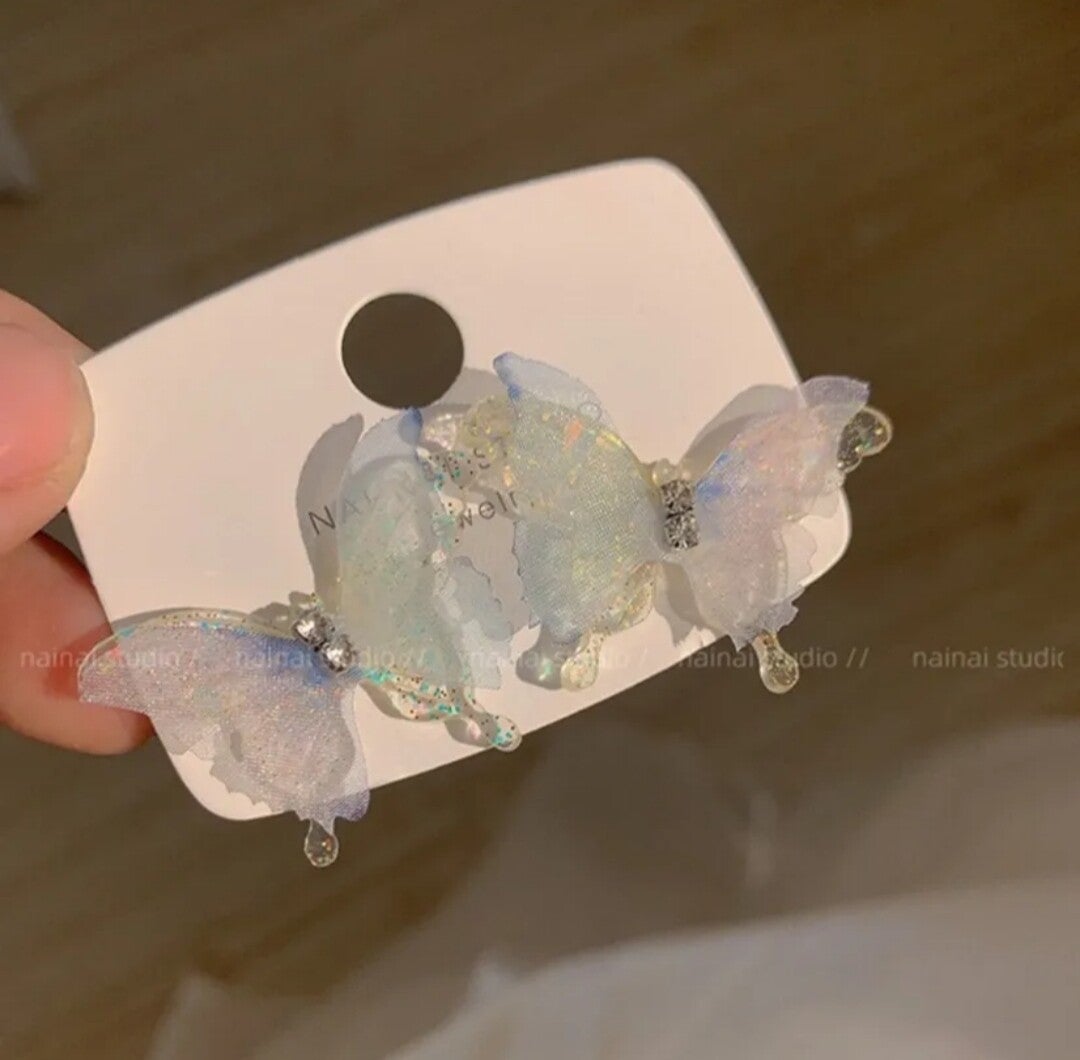 631 Aretes mariposas tornasol