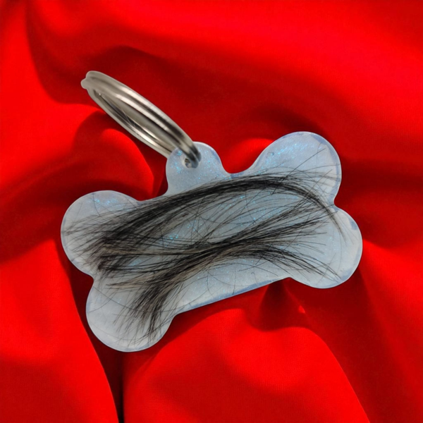 Erinnerungsstück Knochen oder Herz als Schlüsselanhänger