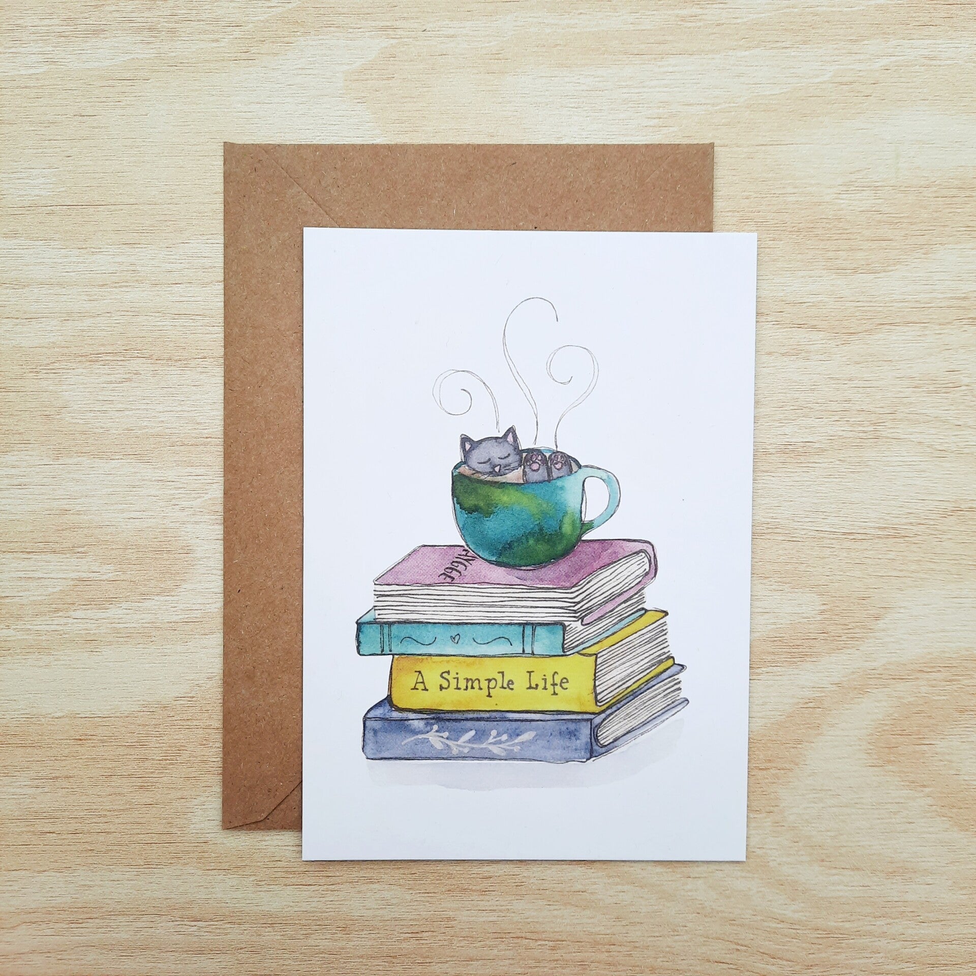 wenskaart "kat in tas met boeken - a simple life"