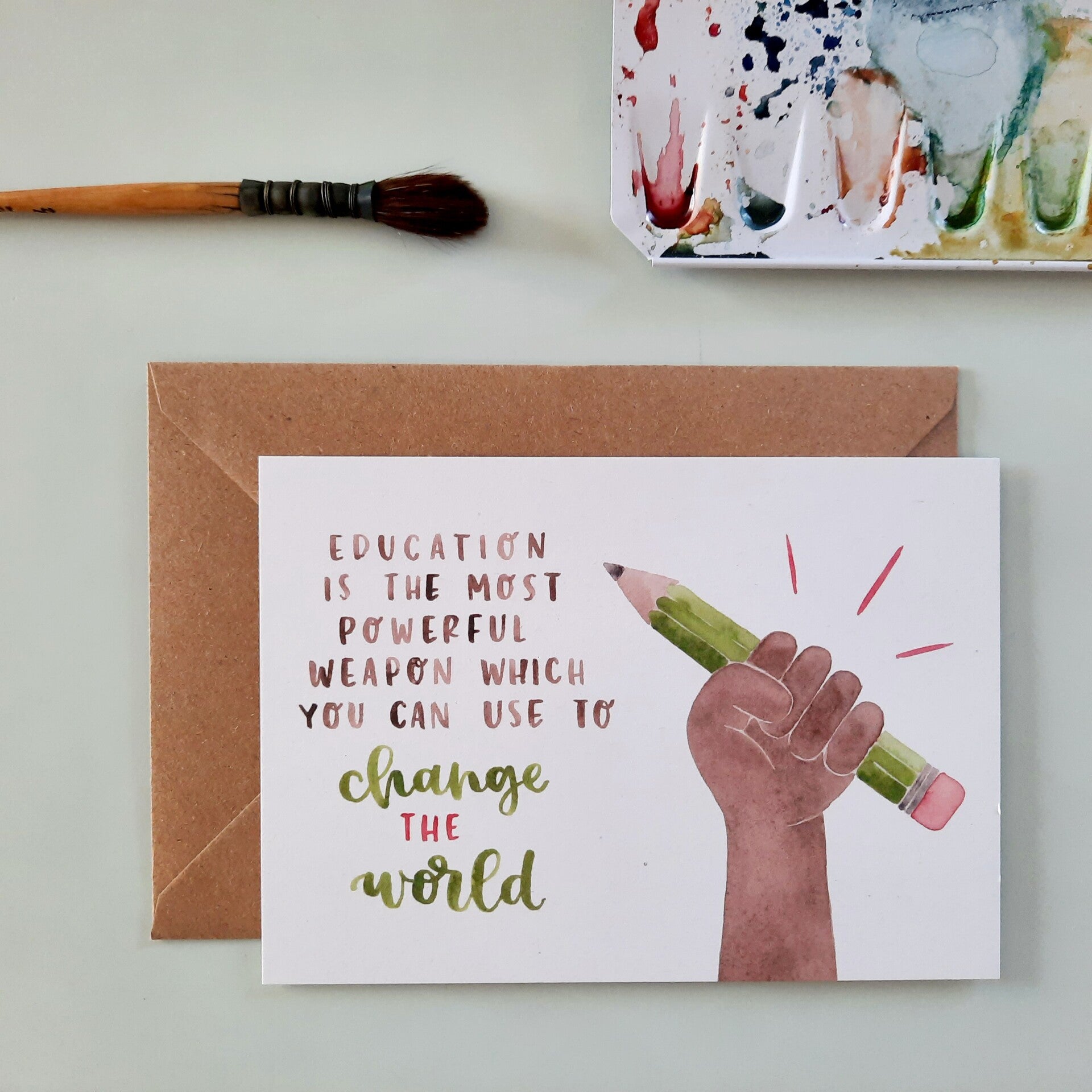 wenskaart "education is the most powerful weapon"
