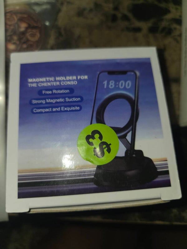 Magnetic cell phone holder for car