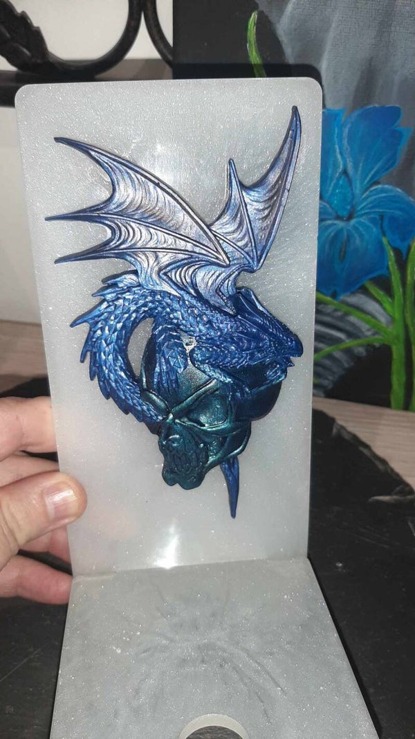 Porte téléphone dragon et crane