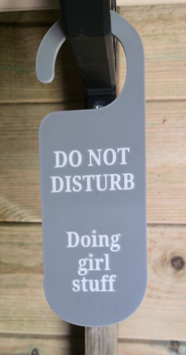 Doing Girl Stuff door hanger
