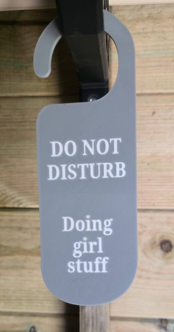 Doing Girl Stuff door hanger