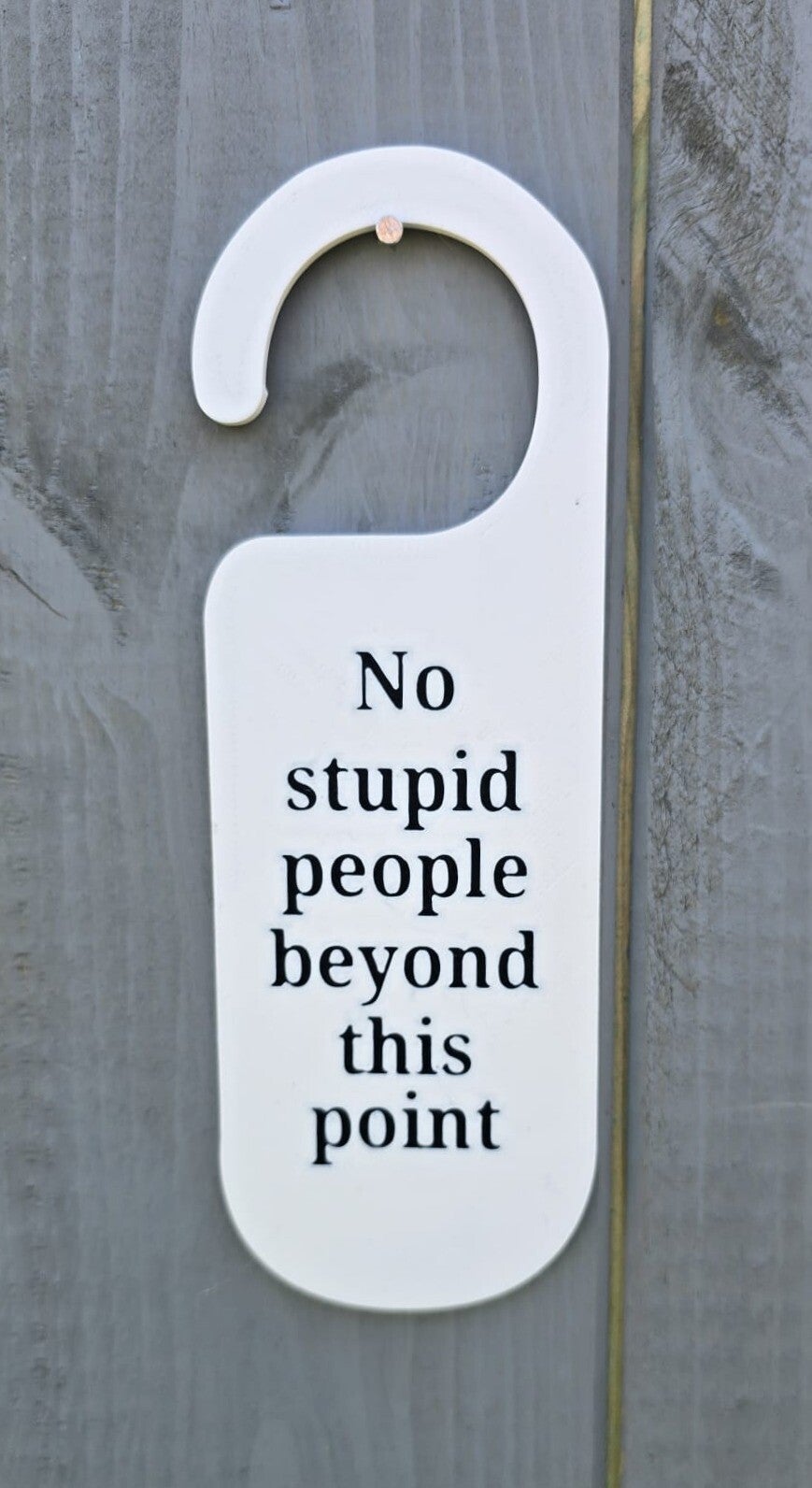 No stupid people beyond this point door hanger