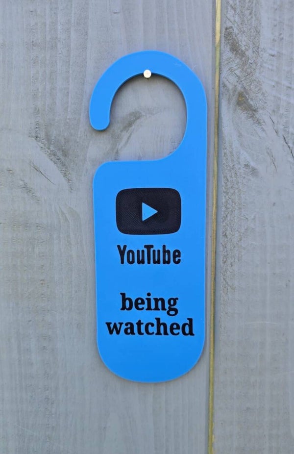YouTube being watched door hanger