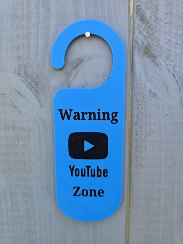 Warning.  YouTube Zone door hanger