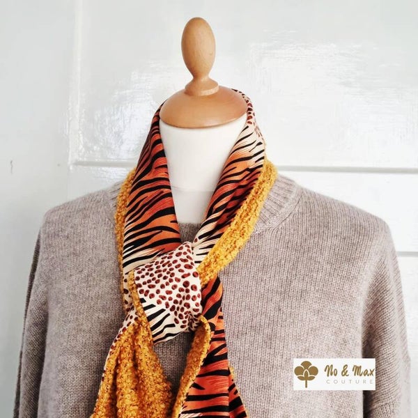 L'Écharpe Snood Bi-Matière : L'atout sauvage et cocooning