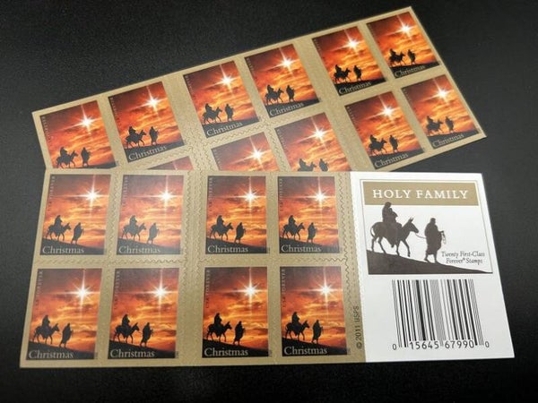 2 Books 2011 Holy Family First Class Postage Forever Stamps