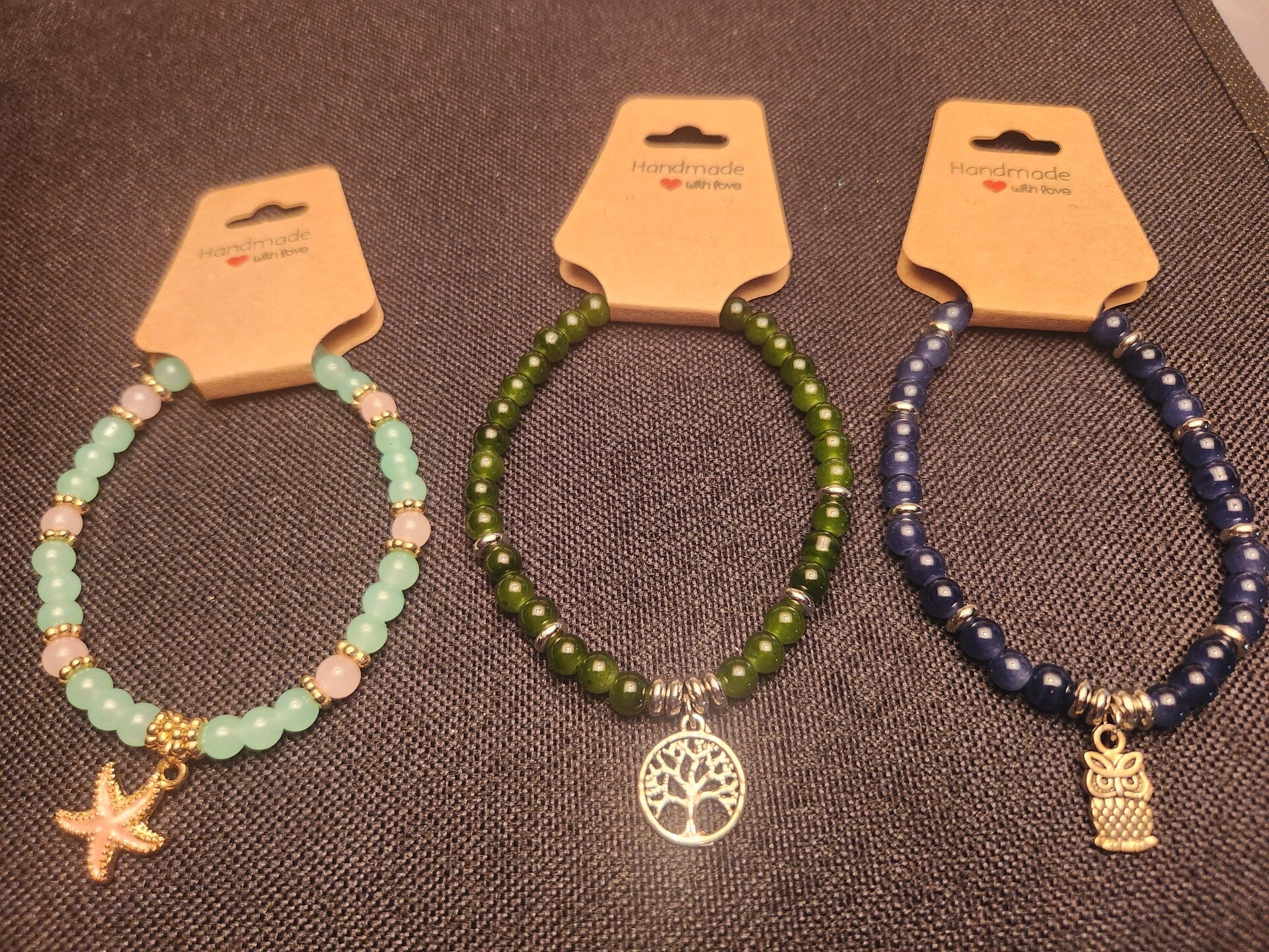 Glass bead bracelets for adults and children. Can all be customized.