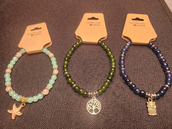 Glass bead bracelets for adults and children. Can all be customized.