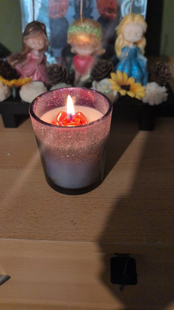 citronella candles in glass tumblers