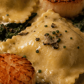 Ravioli Tartufo met coquille en beurre blanc
