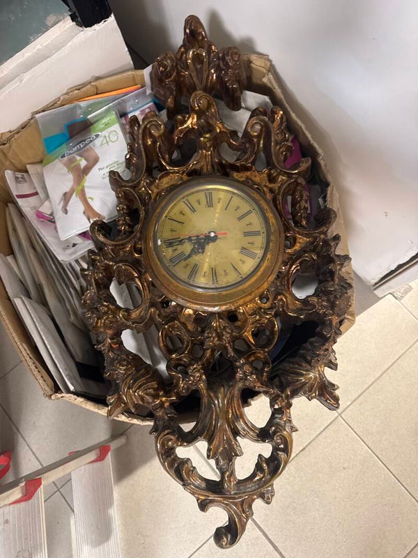 Ornate gold-toned wall clock - vintage